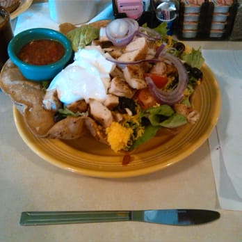 Village Grill - Grilled chicken taco salad, butter knife for reference - Breakfast & Brunch Near Me - Bakersfield, California Village Grill - Grilled chicken taco salad, butter knife for reference - Breakfast & Brunch Near Me - Bakersfield, California