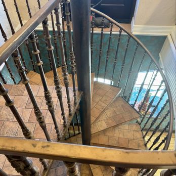 Red River Station Inn - The spiral staircase from the bar to the lobby - Hotels Near Me - Nocona, Texas Red River Station Inn - The spiral staircase from the bar to the lobby - Hotels Near Me - Nocona, Texas