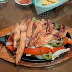 Chicken fajita, hot and sizzling, great amount of food, some chicken overcooked.