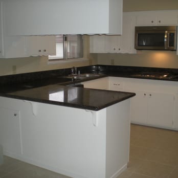 EC Tile Installations - Granite countertops never go out of style. - Tiling Near Me