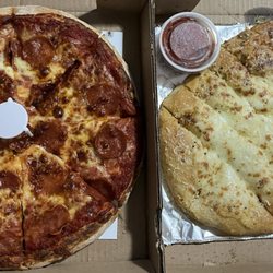 Fatzo's Pizza - 12" pepperoni pizza and an order of cheesy breadsticks total about $25