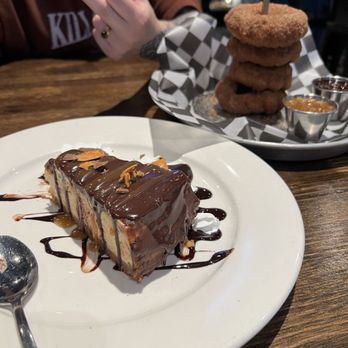 Flappy's Pizza - Butterfinger cheesecake and churro donut tower!!!! - Pizza Near Me - Sonora, California Flappy's Pizza - Butterfinger cheesecake and churro donut tower!!!! - Pizza Near Me - Sonora, California