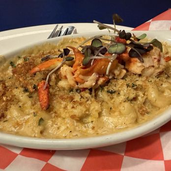 The Nauti Lobstah - LOBSTER MAC & CHEESE Cavatappi pasta tossed in a five-cheese blend of Asiago, Cheddar, Smoked Gouda, Fontina and Parmesan - Seafood Near Me - Apopka, Florida The Nauti Lobstah - LOBSTER MAC & CHEESE Cavatappi pasta tossed in a five-cheese blend of Asiago, Cheddar, Smoked Gouda, Fontina and Parmesan - Seafood Near Me - Apopka, Florida