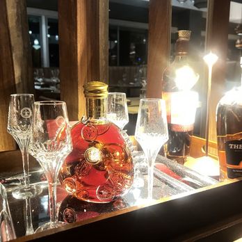 4 Saints - Drinks on display - Bars Near Me - Palm Springs, California 4 Saints - Drinks on display - Bars Near Me - Palm Springs, California