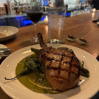 Louie - Pork Chop, Shishito, Chermoula - Italian Near Me - Clayton, Missouri Louie - Pork Chop, Shishito, Chermoula - Italian Near Me - Clayton, Missouri