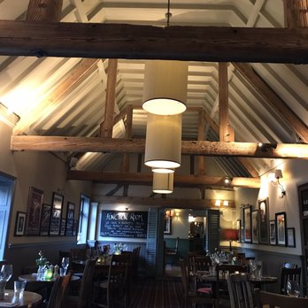 The Carnarvon Arms Hotel - Dining room which was originally the old barn. - Hotels Near Me - Burghclere, HAM