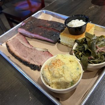 Bludso's BBQ - Dine LA lunch tray with brisket, pork ribs, corn bread, collard greens, and potato salad - Barbeque Near Me - Los Angeles, California