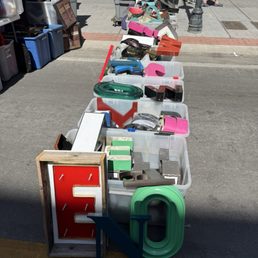 A booth of street signs and reclaimed letters A booth of street signs and reclaimed letters