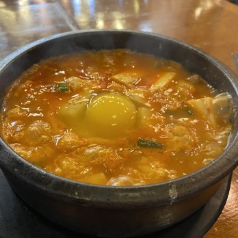 Hoya Korean Kitchen - Beef Soft Tofu Soup. Medium spicy. Was so good! $14 and comes with rice. - Korean Near Me - Fort Worth, Texas Hoya Korean Kitchen - Beef Soft Tofu Soup. Medium spicy. Was so good! $14 and comes with rice. - Korean Near Me - Fort Worth, Texas
