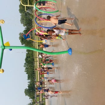Hawk Island County Park - Splash pad is big and has a limited number of chairs and shade coverings. - Parks Near Me - Lansing, Michigan Hawk Island County Park - Splash pad is big and has a limited number of chairs and shade coverings. - Parks Near Me - Lansing, Michigan
