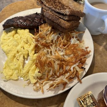 Village Square Cafe - This is stake eggs and potato with bread - Breakfast & Brunch Near Me - Redmond, Washington Village Square Cafe - This is stake eggs and potato with bread - Breakfast & Brunch Near Me - Redmond, Washington