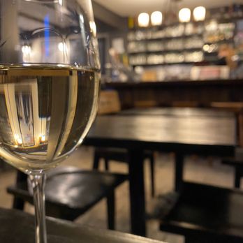 Griffin Gastropub - a glass of wine on a table - Gastropubs Near Me - Bracebridge, Ontario Griffin Gastropub - a glass of wine on a table - Gastropubs Near Me - Bracebridge, Ontario