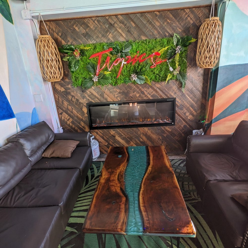 Tropics Cocktail Bar - a cozy spot in the dining room if you don't want the bar or taller bistro tables - Cocktail Bars Near Me - Cocoa Beach, Florida Tropics Cocktail Bar - a cozy spot in the dining room if you don't want the bar or taller bistro tables - Cocktail Bars Near Me - Cocoa Beach, Florida