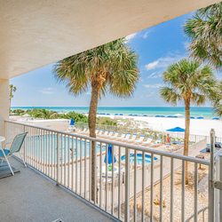 Plumlee Gulf Beach Realty - Take a look at Sand Castle II 205 for a family vacation! Spiral steps go from the balcony to pool deck.
