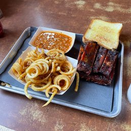 Rib Dinner, Curly Fries, Baked Beans Rib Dinner, Curly Fries, Baked Beans