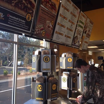 Which Wich - The ordering carousel at Which Wich. - Sandwiches Near Me - Tallahassee, Florida Which Wich - The ordering carousel at Which Wich. - Sandwiches Near Me - Tallahassee, Florida