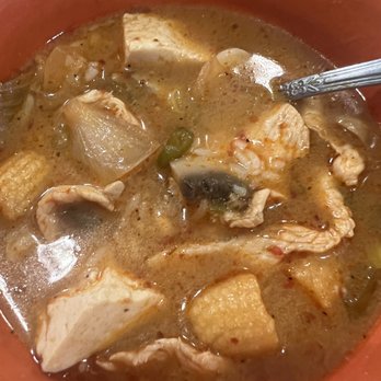 Authentic Thai Kitchen - Tom Yum Soup w/chicken & tofu. Ordered to go, and this is only a 1/3 portion. I ordered white rice to add as well. - Thai Near Me - Phoenix, Arizona