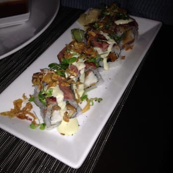 O-Ku - Surf and turf roll. The turf was great but I thought our surf was over fried. - Sushi Bars Near Me - Charleston, South Carolina O-Ku - Surf and turf roll. The turf was great but I thought our surf was over fried. - Sushi Bars Near Me - Charleston, South Carolina