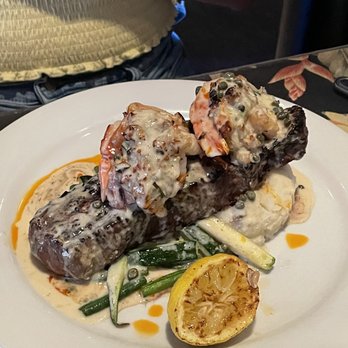 Kaleo's Bar and Grill - 12oz. New York Strip with two stuffed shrimp on top. EXCELLENT !!!! - Hawaiian Near Me - Pahoa, Hawaii Kaleo's Bar and Grill - 12oz. New York Strip with two stuffed shrimp on top. EXCELLENT !!!! - Hawaiian Near Me - Pahoa, Hawaii