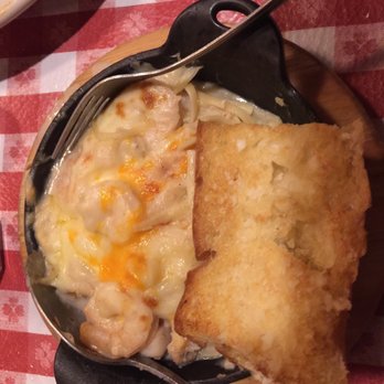 Vinny Vanucchi's - Seafood Italiano with garlic bread - Italian Near Me - Galena, Illinois Vinny Vanucchi's - Seafood Italiano with garlic bread - Italian Near Me - Galena, Illinois