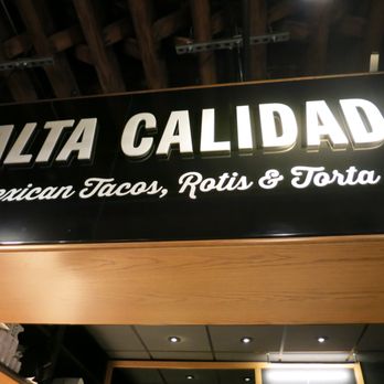 Alta Calidad - a sign for a mexican tacos restaurant - Mexican Near Me - Brooklyn, New York