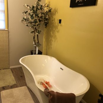 Dash Sitework Services - New bathroom flooring & free standing bathtub - Painters Near Me Dash Sitework Services - New bathroom flooring & free standing bathtub - Painters Near Me