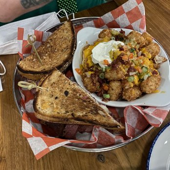 Recess - Loaded Tater Tots and Reuben sandwich - American Near Me - Chicago, Illinois Recess - Loaded Tater Tots and Reuben sandwich - American Near Me - Chicago, Illinois