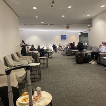 Swissport Lounge - A picture of a portion of the empty seats inside the lounge. - Airport Lounges Near Me - Chicago, Illinois