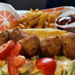 The Saucy Shrimp - Crab cake bites po'boy