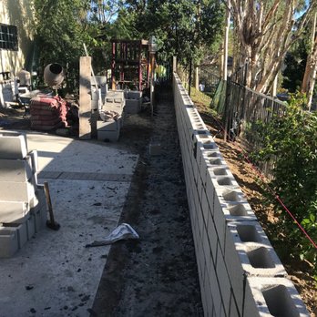 Sandstone Construction - Building a property line wall in Yorba Linda. - Masonry/Concrete Near Me Sandstone Construction - Building a property line wall in Yorba Linda. - Masonry/Concrete Near Me