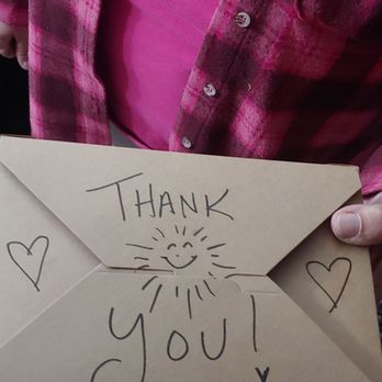 Vogue Bistro - a person holding a thank card - French Near Me - Surprise, Arizona Vogue Bistro - a person holding a thank card - French Near Me - Surprise, Arizona