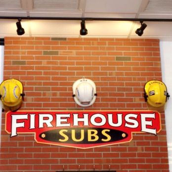 Firehouse Subs - a fireman's helmet mounted on a brick wall - Fast Food Near Me - San Tan Valley, Arizona