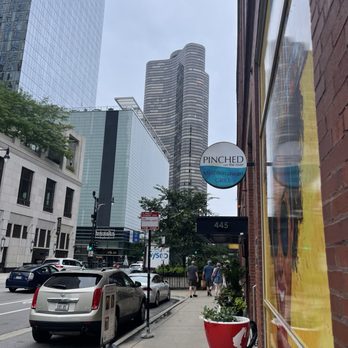 Pinched on the River - The street sign from the store side - go through store to reach restaurant - Mediterranean Near Me - Chicago, Illinois Pinched on the River - The street sign from the store side - go through store to reach restaurant - Mediterranean Near Me - Chicago, Illinois