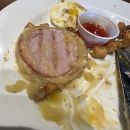 Eggs Benny with a semi-creamy "hollandaise" and overcooked egg.