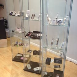 Downtown Smoke Shop - Displays of various vape products and accessories.