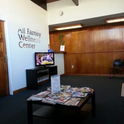 All Family Wellness Center Clinic - The waiting room area & the front desk.