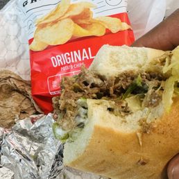 Philly cheesesteaks and chips Philly cheesesteaks and chips