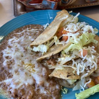 Mexicanisimo - a plate of food on a table - Mexican Near Me - El Paso, Texas Mexicanisimo - a plate of food on a table - Mexican Near Me - El Paso, Texas