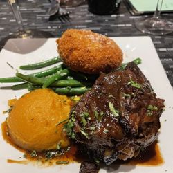 Short ribs, potato pancake and squash. Delicious.