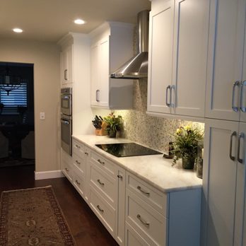 Cabinet Shade Tree - a kitchen with white cabinets - Cabinetry Near Me - Oviedo, Florida Cabinet Shade Tree - a kitchen with white cabinets - Cabinetry Near Me - Oviedo, Florida