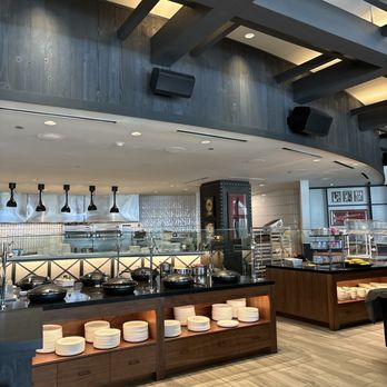 The Kitchen - a buffet with a variety of food items - New American Near Me - Orlando, Florida The Kitchen - a buffet with a variety of food items - New American Near Me - Orlando, Florida