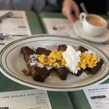 Java & Jam - Banana nut French toast w/ homemade whipped cream, coconut flakes and mango - Breakfast & Brunch Near Me - Fort Lauderdale, Florida