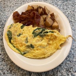 Crab & Spinach Omelette w/ Home Fries and Bacon Crab & Spinach Omelette w/ Home Fries and Bacon