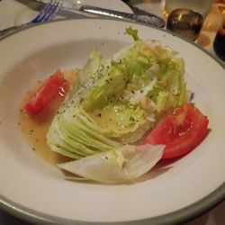 The Cub Lounge and Grille - Wedge salad. Fresh lettuce and Italian dressing.