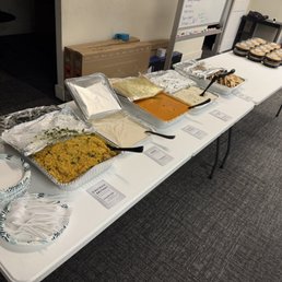 Chicken Biriyani, Raita, Butter Chicken, Steamed Rice, and Butter Naan.