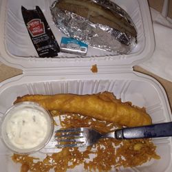 2 pieces of fish is menu item, which is 1 fish they cut up, baked potato, we ordered 1 more.