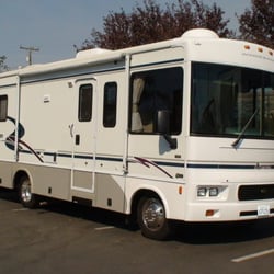 SLEEPS 2 ADULTS & 2 CHILDREN. Features Include: Slide-Out, a Walk-Around Queen Bed, Dinette Bed, Private Bathroom & Shower, Outs