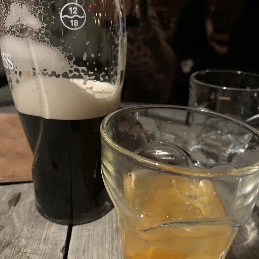 Guinness and a whiskey sour Guinness and a whiskey sour