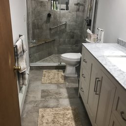 a bathroom with a walk in shower