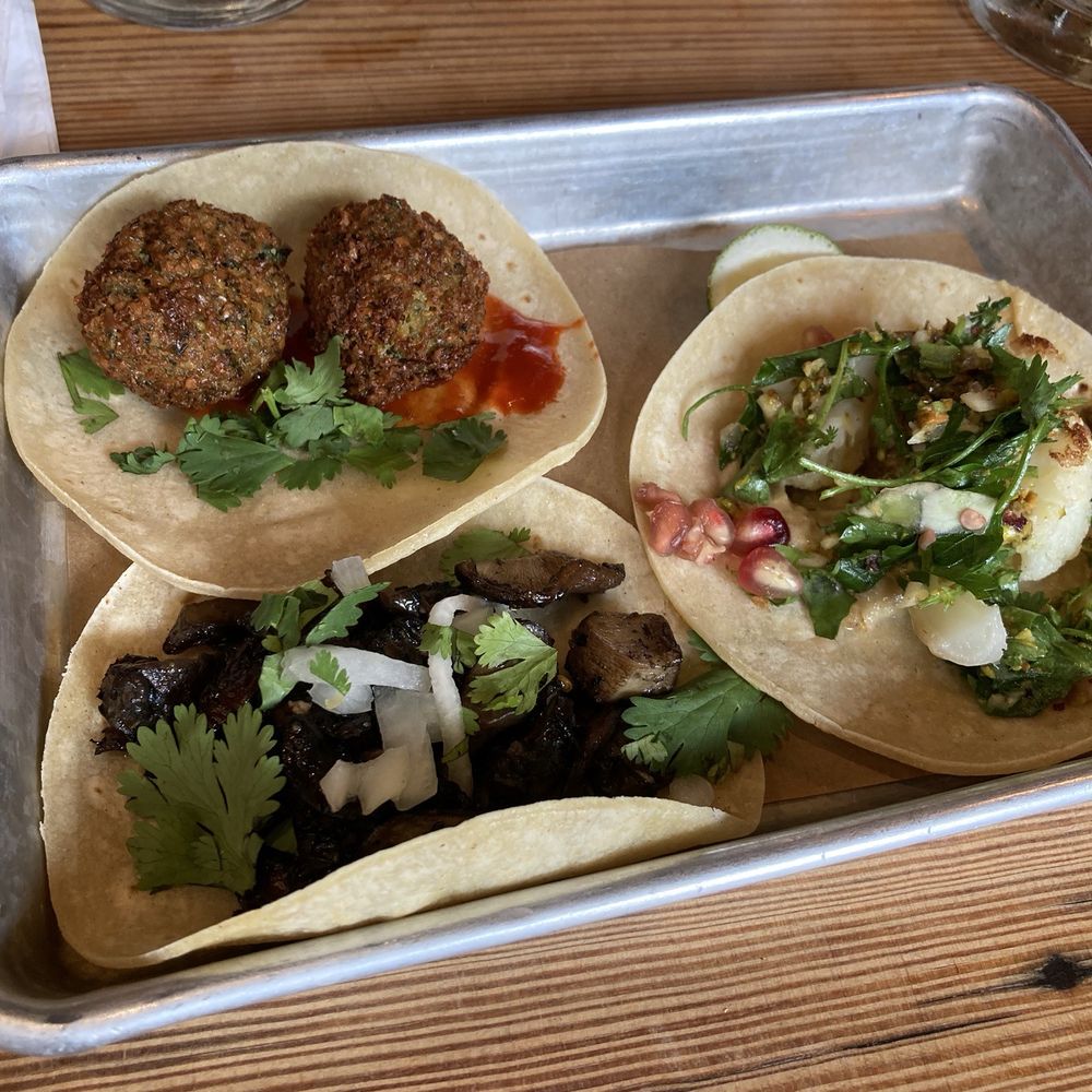 Bartaco - A falafel taco, a mushroom taco and a cauliflower taco (all made vegan). - Tacos Near Me - Charleston, South Carolina Bartaco - A falafel taco, a mushroom taco and a cauliflower taco (all made vegan). - Tacos Near Me - Charleston, South Carolina